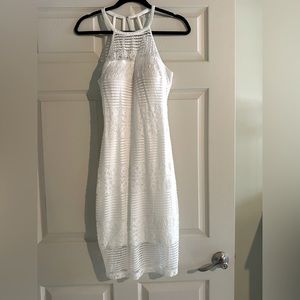 Guess brand- White strappy halter. Lace and built in bra